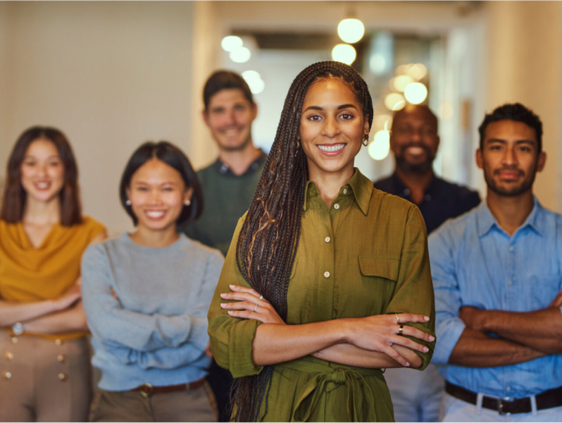 Six people of different nationalities smiling