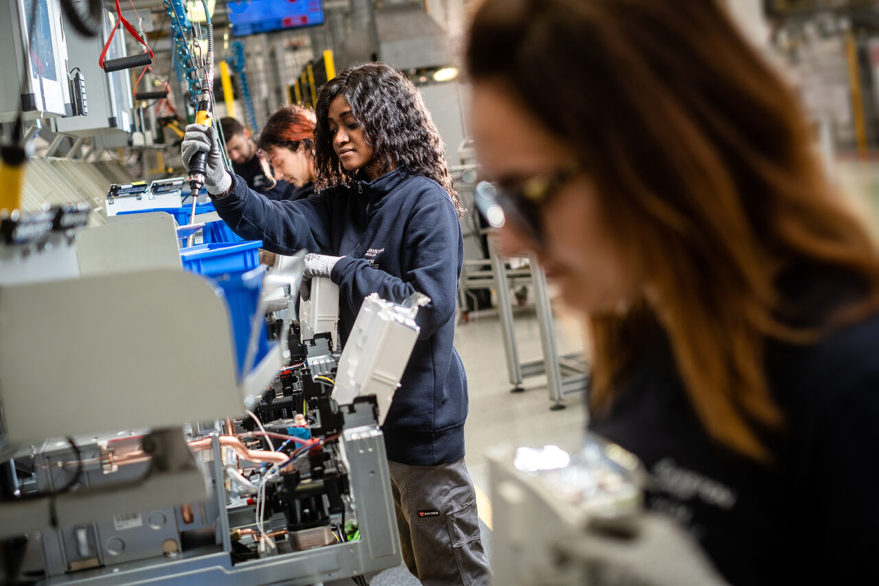 group of employees ina factory